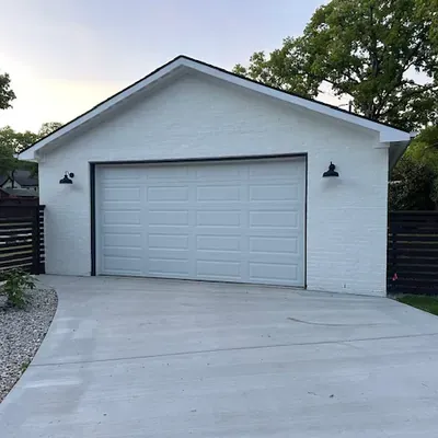 Newly built white brick detached garage with driveway — Celina, TX | Goldstar Renovations