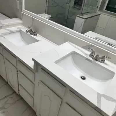 Double vanity bathroom remodel with marble countertop — Frisco, TX