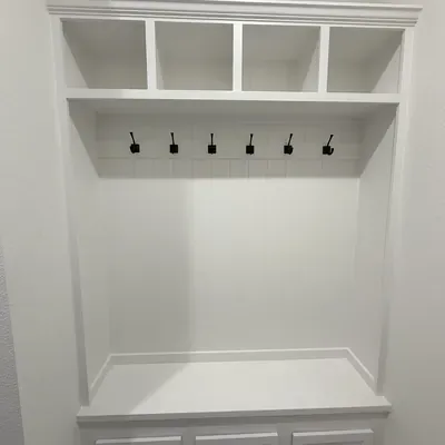 Custom mudroom built-in shelving with coat hooks — Allen, TX | Goldstar Renovations