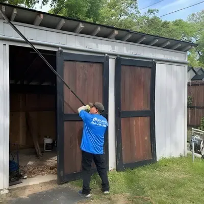 Backyard shed exterior restoration and repainting — Terrell, TX | Goldstar Renovations