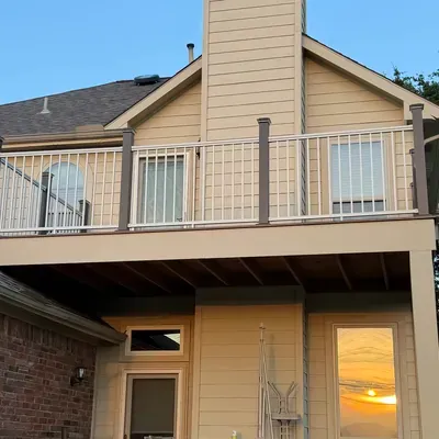 Two-story balcony deck construction with railing — Anna, TX | Goldstar Renovations