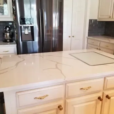 White kitchen remodel with marble countertops and gold hardware — Allen, TX | Goldstar Renovations